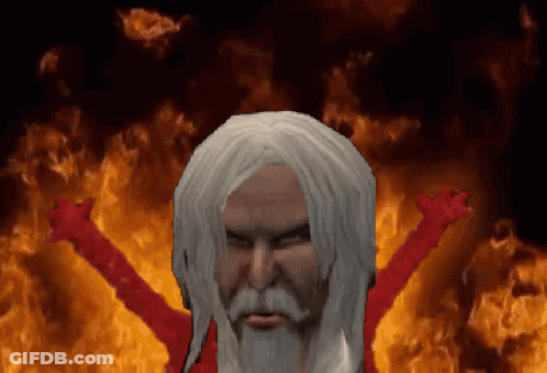 A Man With White Hair And A Beard Is In Front Of A Fire Background GIF