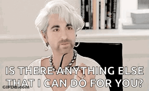 A Man With White Hair And A Beard Is Sitting In A Chair And Asking Is There Anything Else That I Can Do For You GIF