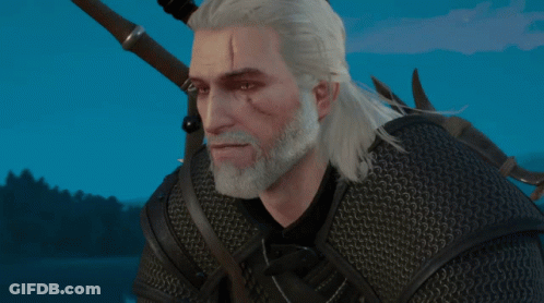 A Man With White Hair And A Beard Is Wearing A Black Jacket GIF