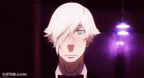 A Man With White Hair And A Bow Tie Is Standing In A Dark Room GIF