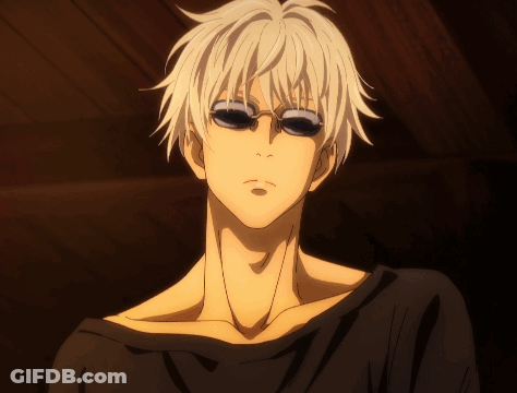 A Man With White Hair And Black Sunglasses Looks At The Camera GIF