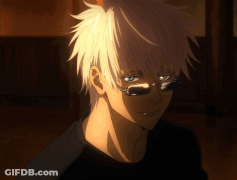 A Man With White Hair And Glasses Is Smiling GIF