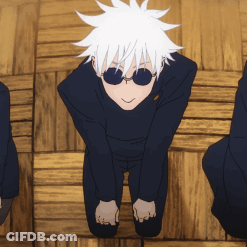 A Man With White Hair And Sunglasses Is Kneeling Down On The Floor GIF
