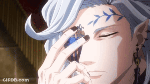A Man With White Hair Has A Tattoo On His Forehead That Looks Like A Flower GIF