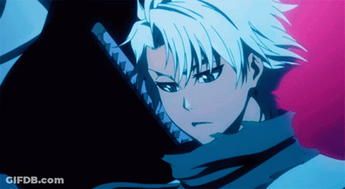 A Man With White Hair Is Holding A Sword In His Right Hand GIF