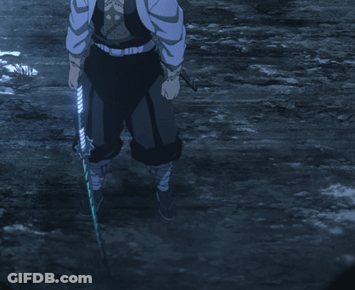 A Man With White Hair Is Kneeling Down With A Sword In Front Of Him GIF