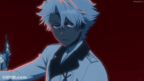 A Man With White Hair Is Standing In Front Of A Red Background With Animelist.tv Written On The Bottom GIF