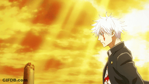 A Man With White Hair Is Standing In Front Of An Orange Sky GIF