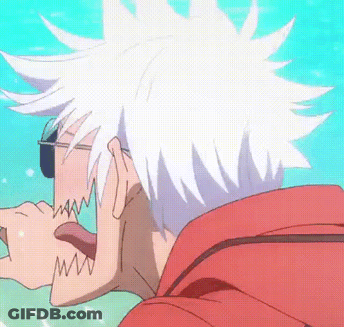 A Man With White Hair Is Wearing Sunglasses And Has His Tongue Sticking Out GIF