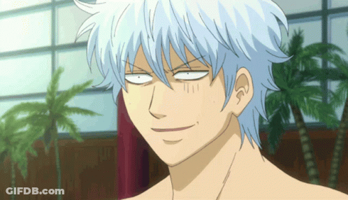 A Man With White Hair Making A Funny Face With His Eyes Closed GIF