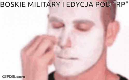 A Man With White Paint On His Face Is Rubbing His Nose GIF