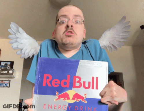 A Man With Wings Holds A Can Of Red Bull Energy Drink GIF