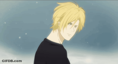 A Man With Yellow Hair And A Black Shirt GIF