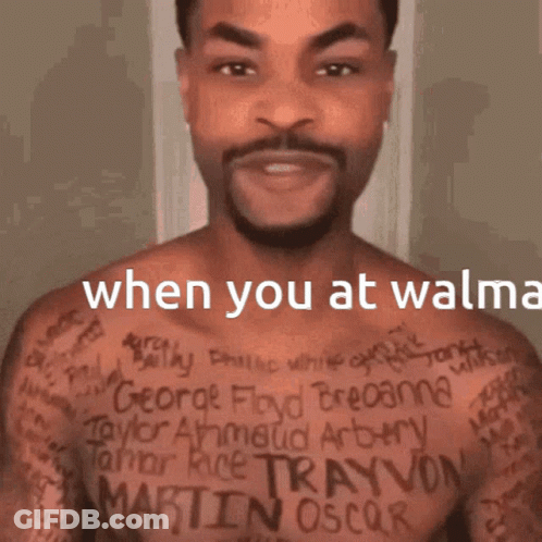 A Man Without A Shirt Has A Lot Of Tattoos On His Chest Including The Name Martin Oscar GIF