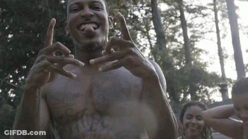 A Man Without A Shirt Has A Tattoo On His Chest That Says ' I Love You ' GIF