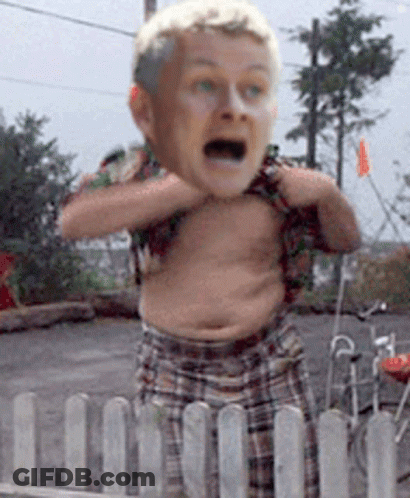 A Man Without A Shirt Is Behind A Fence With His Mouth Open GIF