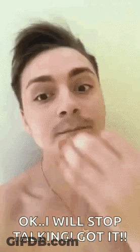 A Man Without A Shirt Is Eating A Banana And Says `` Ok I Will Stop Talking ! Got It ! '' GIF