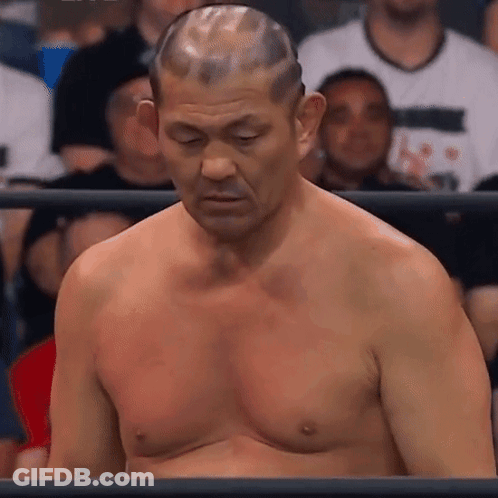 A Man Without A Shirt Is In A Boxing Ring GIF