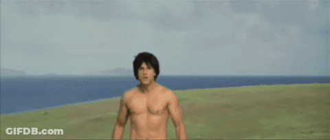 A Man Without A Shirt Is Looking At The Camera GIF