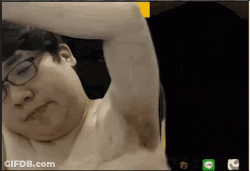 A Man Without A Shirt Is On A Video Call With A Green Line Icon In The Corner GIF