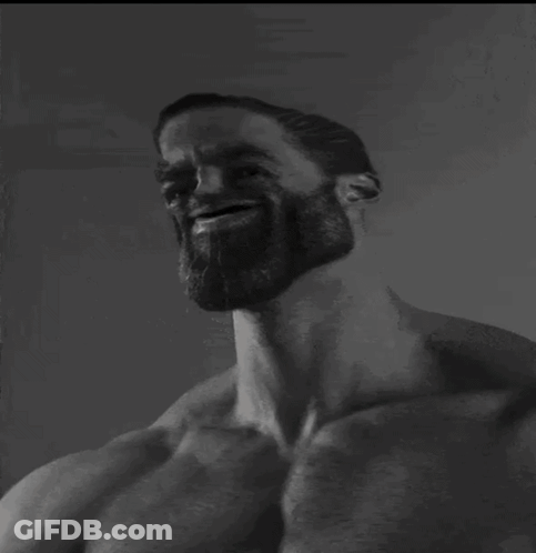 A Man Without A Shirt Is Reading A Book With Skulls On The Spine GIF