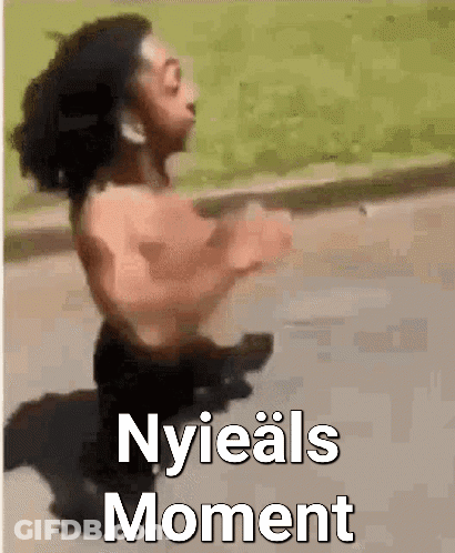 A Man Without A Shirt Is Running Down The Street With The Words Nyieals Moment Written On The Bottom . GIF