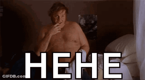 A Man Without A Shirt Is Sitting On A Bed With The Word " Hehe " Written On The Bottom GIF