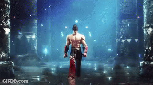 A Man Without A Shirt Is Standing In A Dark Room With Columns GIF
