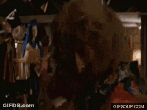 A Man Without A Shirt Is Standing In A Room With A Gif Soup.com Watermark GIF