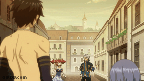A Man Without A Shirt Is Standing In A Street Talking To A Woman And A Boy GIF