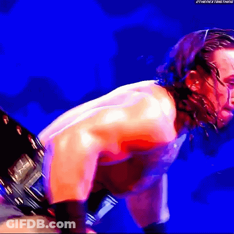 A Man Without A Shirt Is Standing In Front Of A Blue Background With The Hashtag #Thenextbigthing GIF