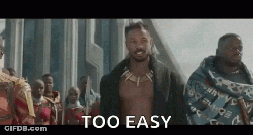 A Man Without A Shirt Is Standing In Front Of A Group Of People And Says `` Too Easy '' . GIF