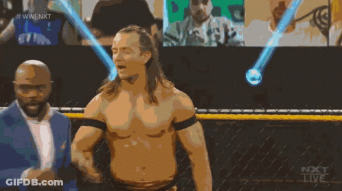 A Man Without A Shirt Is Standing In Front Of A Screen That Says Next Live GIF