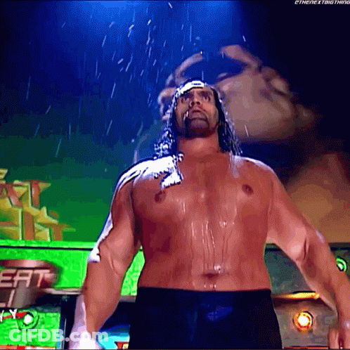 A Man Without A Shirt Is Standing In The Rain With The Next Thing Written On The Bottom Right GIF