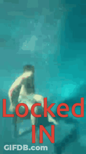 A Man Without A Shirt Is Standing In The Water With The Words Locked In Behind Him GIF
