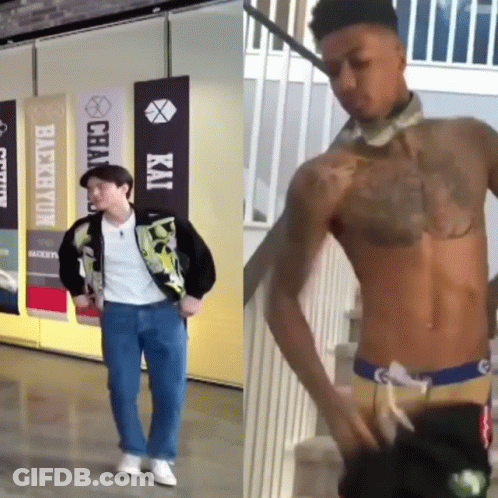 A Man Without A Shirt Is Standing Next To A Man With A Tattoo On His Chest GIF