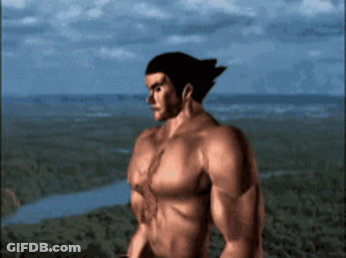 A Man Without A Shirt Is Standing On A Hill Overlooking A River GIF