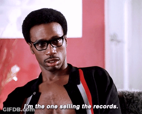 A Man Without A Shirt Is Talking About Selling The Records GIF