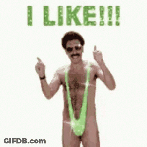 A Man Without A Shirt Is Wearing A Green Thong And Giving A Middle Finger . GIF