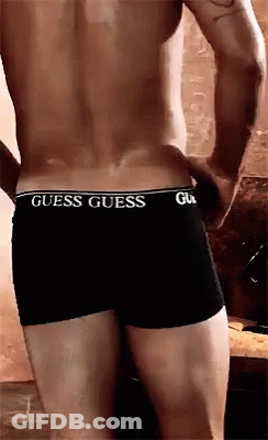 A Man Without A Shirt Is Wearing A Pair Of Guess Underwear GIF