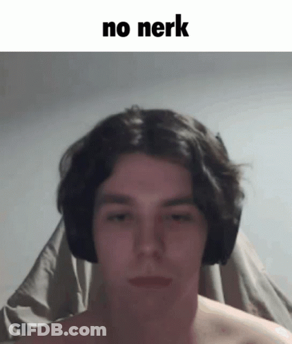 A Man Without A Shirt Is Wearing Headphones And Making A Face . GIF