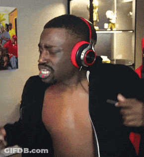 A Man Without A Shirt Is Wearing Headphones GIF