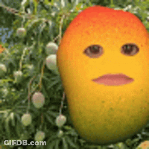 A Mango With A Face On It Is Sitting In A Tree . GIF