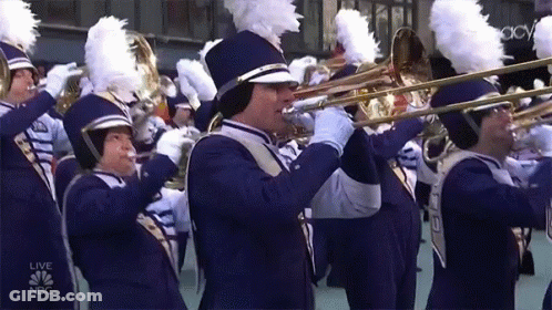 A Marching Band Is Performing On A Live Nbc Channel GIF