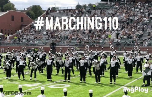A Marching Band Performs On A Field With The Words Marching 110 Written On The Bottom GIF