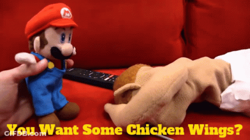 A Mario And A Chicken Wing Puppet Are Sitting On A Red Couch With The Caption " You Want Some Chicken Wings " GIF