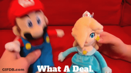 A Mario And Rosalina Stuffed Animal Are Being Held By A Person GIF