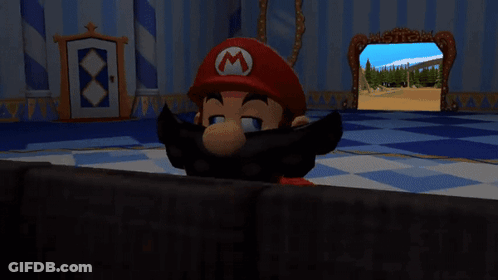 A Mario Character Is Sitting On A Couch In Front Of A Tv GIF
