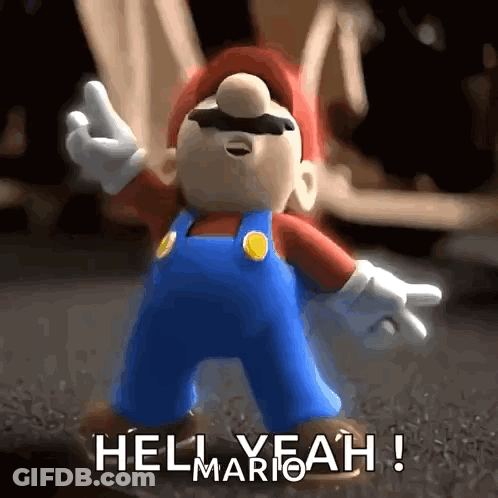 A Mario Figurine Says Hell Yeah In A GIF