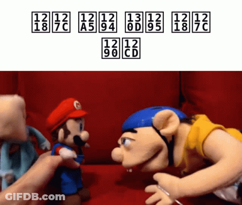 A Mario Puppet Is Being Touched By A Person GIF